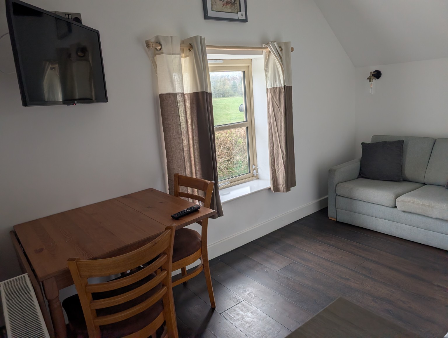 The Hayloft: the living and dining area under the eaves.